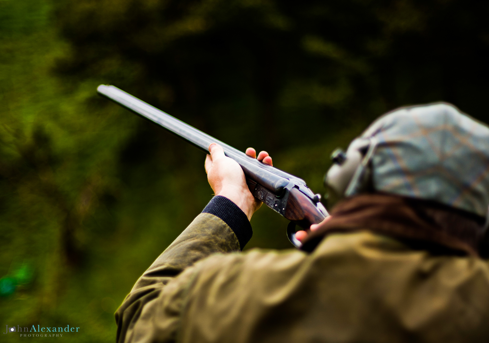 gun with side by side shotgun shooting pheasants